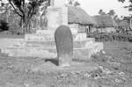 Stone monument in village
