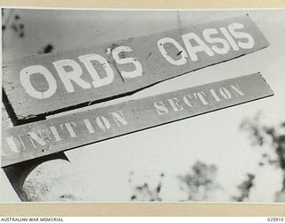 PORT MORESBY, PAPUA. 1942-07-15. ARMY DIRECTION SIGNS ON A NEW GUINEA BUSH TRACK