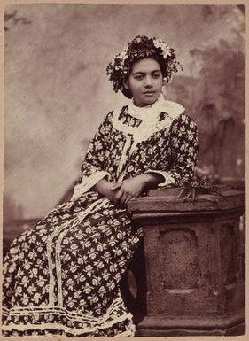 Studio portrait of woman with a garland on her head. From the album: Tahiti, Samoa and New Zealand scenes