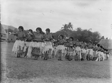 [Pacific island women performing outdoors]