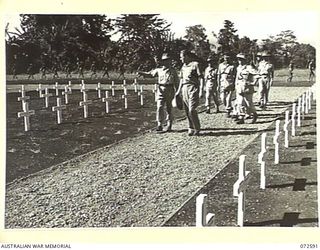 LAE, NEW GUINEA. 1944-04-23. NX8 LIEUTENANT-GENERAL SIR LESLIE MORSHEAD, KCB, KBE, CMG, DSO, ED, GOC SECOND AUSTRALIAN ARMY & GOC NEW GUINEA FORCE (1), ESCORTS THE HONOURABLE E.J. WARD, MINISTER ..