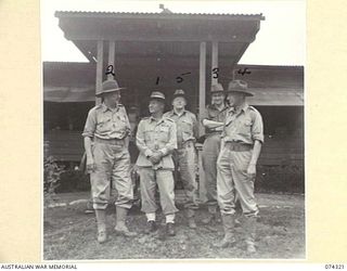 WAU, NEW GUINEA. 1944-07-02. NX366 MAJOR GENERAL A.J. BOASE, CBE, GOC, 11TH DIVISION (1) AND MEMBERS OF THE EMPIRE PARLIAMENTARY DELEGATION OUTSIDE THE AUSTRALIAN NEW GUINEA ADMINISTRATIVE UNIT ..