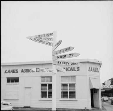 A road sign in front of Lane's Agricultural Chemicals building, Fiji, November 1966 / Michael Terry