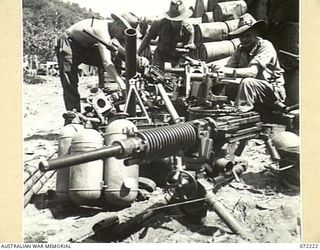 KILIGIA BEACH, NEW GUINEA. 1944-04-09. NX171905 STAFF-SERGEANT C. HARRIS (1), QX53430 CORPORAL R. WHITLOCK (2), AND QX49258 LANCE-SERGEANT N. NEELS (3), MEMBERS OF A 5TH DIVISION SALVAGE UNIT ..