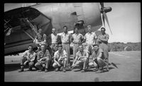 [Servicemen with Grumman TBF Avenger aircraft]