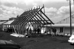University of Auckland architecture students pre-fabricating house in Architecture parking lot for Hooper family in Fakaogo, Tokelau.
