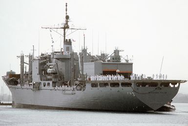 Port quarter view of the combat stores ship USS NIAGARA FALLS (AFS 3) arriving at Naval Station Guam