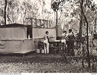 WONDECLA, QLD. 1943-10-07. TROOPS OF "B" COMPANY, 2/5TH AUSTRALIAN INFANTRY BATTALION, 17TH AUSTRALIAN INFANTRY BRIGADE, CLEANING UP AFTER THEIR TOUR OF DUTY IN NEW GUINEA, BEFORE BEING SENT SOUTH ..