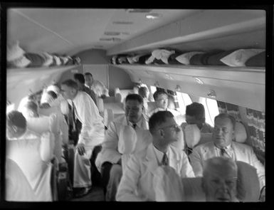 Hon Tupua Tamasese Mea'ole and other passengers on board aircraft, TEAL (Tasman Empire Airways Limited), Satapuala, Upolu, Samoa