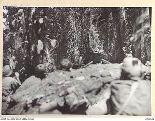 BOUGAINVILLE. 1945-04-05. TROOPS COVERING MATILDA TANKS FROM SLATER'S KNOLL, FOLLOWING THE FAILURE OF A JAPANESE COUNTER ATTACK AGAINST BATTALION HQ AND B COMPANY, 25 INFANTRY BATTALION. THE ..