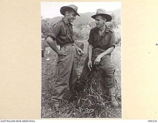 DAGUA, NEW GUINEA. 1945-03-30. LANCE CORPORAL E. DUNCAN (1), AND PRIVATE L.J. SHERREN (2), MEMBERS OF THE 2/2 INFANTRY BATTALION