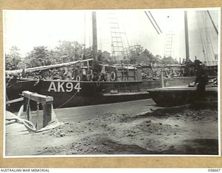 TERAPO, NEW GUINEA, 1943-09-16. KETCH AK94 PULLING IN AT THE AUSTRALIAN MOVEMENT CONTROL WHARF