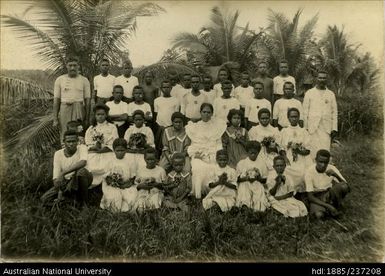 Group of people from the London Mission Society station at Daru