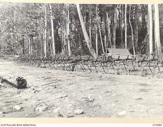 LAE, NEW GUINEA. 1944-09-15. A GENERAL VIEW OF THE TESTING RANGE WHERE TRIALS WERE CARRIED OUT BY THE DEPUTY DIRECTOR OF MECHANICAL ENGINEERING, HEADQUARTERS, NEW GUINEA FORCE WITH CORROSION ..