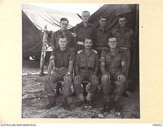 WEST WEWAK BEACH, NEW GUINEA. 1945-09-01. PERSONNEL OF 6 MILITARY HISTORY FIELD TEAM, ATTACHED HEADQUARTERS 6 DIVISION. IDENTIFIED PERSONNEL ARE:- SERGEANT D.T. EASTMAN, CINE PHOTOGRAPHER (1); ..