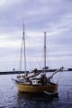 French Polynesia, sailboat anchored off shore of Tahiti Island