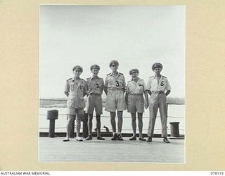 MADANG, NEW GUINEA. 1944-11-20. OFFICERS OF THE ROYAL AUSTRALIAN NAVY VESSEL, HMAS "BENDIGO" ABOARD THEIR VESSEL IN THE HARBOUR