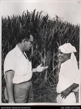 Field Officer speaking to Farmer