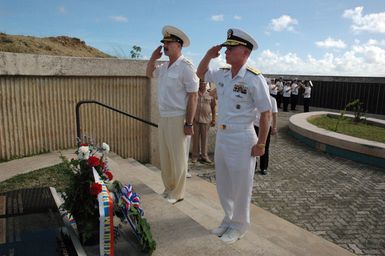 CHIEF of STAFF (CS) and First Deputy Commander of Russian Federated Navy (RFN) Pacific Fleet, Vice Admiral (VADM) Konstantin Sidenko and US Navy (USN) Commander of US Naval Forces Marianas (USNFM) Rear Admiral (RADM) (Upper Half) Joe Leidig salute after placing a wreath at the War in the Pacific National Historical Park, at Asan Bay, Guam (GU)