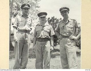 LAE, NEW GUINEA. 1944-09-16. VX3927 XCAPTAIN A. SMITH, AIDE-DE-CAMP TO THE GENERAL OFFICER COMMANDING NEW GUINEA FORCE (1), CHIEF COMMISSIONER G. PALMER, SALVATION ARMY (2), AND VX155 CAPTAIN J.H. ..