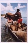 Loading cacao on cargo boat 1 of 3