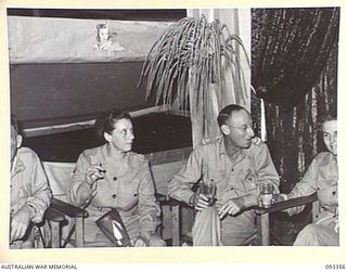 LAE AREA, NEW GUINEA, 1945-06-30. A GROUP IN BETWEEN DANCES AT THE SERGEANT'S MESS DURING A DANCE HELD BY 112 CONVALESCENT DEPOT
