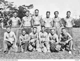 Members of the cricket team from the 2/4th Field Squadron, who played a team from the 165th General Transport Company. On 25 September, the members of the team were presented with wallets provided ..