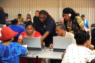 Earthquake ^ Tsunami - Utulei, American Samoa, October 8, 2009 -- FEMA Disaster Recovery Center Group Supervisor, Valerie Aubert, and Alefa Afalava, Individual Assistance Officer for the territory of American Samoa, provide registration intake guidance to local hires. David Gonzalez/FEMA