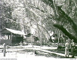 THE SOLOMON ISLANDS, 1945-10-13. GENERAL VIEW OF JAPANESE LIVING QUARTERS AT KANDAS ISLAND INTERNMENT CAMP. (RNZAF OFFICIAL PHOTOGRAPH.)