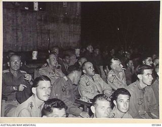 BOUGAINVILLE. 1945-05-10. LIEUTENANT GENERAL V.A.H. STURDEE, GENERAL OFFICER COMMANDING FIRST ARMY (7), ACCOMPANIED BY BRIGADIER J.R. STEVENSON, COMMANDER 11 INFANTRY BRIGADE (6), AND STAFF ..