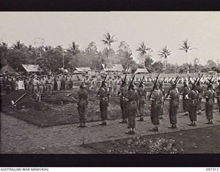 SOPUTA, NEW GUINEA. 1943-09-29. BURIAL SERVICE FOR BRIGADIER R. B. SUTHERLAND WHICH WAS CONDUCTED BY QX6293 PADRE S. COWEN, DEPUTY ASSISTANT CHAPLAIN-GENERAL OF THE CHURCH OF ENGLAND