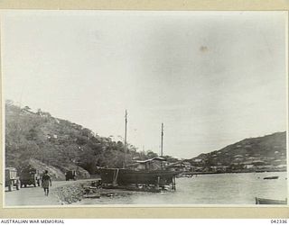 PORT MORESBY, NEW GUINEA. 1944-01-11. PORT MORESBY, FORESHORE, LOOKING SOUTHEAST FROM MARINE SECTION, RAAF. SLIPS FOR RAAF LUGGERS IN FOREGROUND