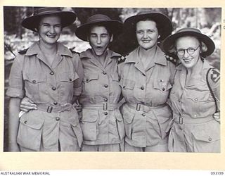 BOUGAINVILLE, 1945-06-18. NURSING SISTERS OF 109 CASUALTY CLEARING STATION, MOTUPENA POINT. IDENTIFIED PERSONNEL ARE:- LT L.M.G. ANDERSON (1); LT E.A. EMBLING (2); CAPTAIN ELIZABETH IRENE UREN (3); ..