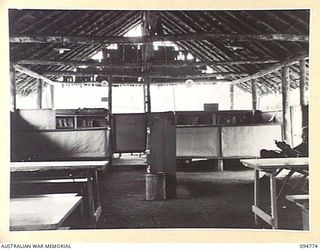 LAE AREA, NEW GUINEA, 1945-08-10. THE INTERIOR OF THE STUDY HUT, 112 CONVALESCENT DEPOT, EDUCATION CENTRE UNDER THE COMMAND OF THE DEPUTY ASSISTANT DIRECTOR OF EDUCATION, LAE BASE SUB-AREA