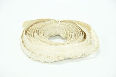 Roll of plaited fibre