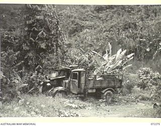 YAULA, NEW GUINEA. 1944-04-09. ONE OF MANY JAPANESE TRUCKS FOUND BY THE 57/60TH INFANTRY BATTALION DURING THEIR RAPID DRIVE TO BOGADJIM