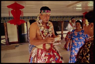 Conferring of Matai Ariki titles, Sāmoa. The new matai prepares for the saofa'i