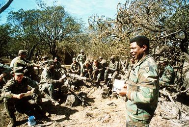 Chaplain Robert N. Manzy conducts Protestant services for members of the 1ST Brigade, 25th Infantry Division, as they participate in an exercise at the Pohakuloa Training Area