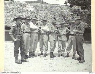 PORT MORESBY, NEW GUINEA. 1944-02-07. OFFICERS OF THE AUSTRALIAN NEW GUINEA ADMINISTRATIVE UNIT HEADQUARTERS, WITH OFFICERS OF THE FIELD STAFF AT A SIX DAY CONFERENCE ON DISTRICT ADMINISTRATION. ..