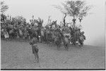 Pig festival, singsing, Tsembaga hosts Tsengamp: decorated men with kundu drums on dance ground