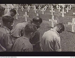 WAU, NEW GUINEA. 1943-08-29. CELEBRANTS AT THE FIRST REQUIEM MASS IN THE WAU WAR CEMETERY