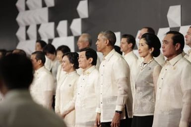 Barack Obama joins Asia Pacific Economic Cooperation Summit leaders and spouses for a group photo in Pasay, Metro Manila, Philippines, November 18, 2015