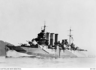 SYDNEY, NSW. COUNTY CLASS CRUISER HMAS SHROPSHIRE ENTERING SYDNEY HARBOUR SHOWING HER PORT FORWARD VIEW. FOLLOWING THE LOSS OF HMAS CANBERRA ON 1942-08-09 SHROPSHIRE WAS OFFERED AS A REPLACEMENT BY ..