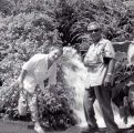 Chris Mensalvas and wife Irene Mensalvas near waterfall in Maui, Hawaii, approximately 1970