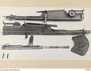 LAE, NEW GUINEA. 1944-09-15. THE EFFECTS OF THE TROPICAL CONDITIONS ON THE VARIOUS PARTS OF BREN GUNS USING SHELL RUSTSEAL 300. THESE TESTS WERE MADE DURING AN EXPERIMENT CONDUCTED BY THE DEPUTY ..