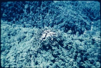 Village on spur, site of the (Panguna?) mine's beginning : Bougainville Island, Papua New Guinea, March 1971 / Terence and Margaret Spencer