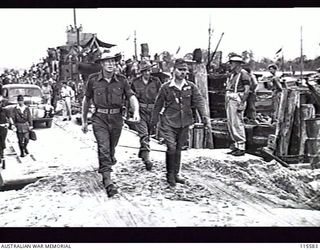 TOROKINA. 1945-09-08. LIEUTENANT GENERAL (LT GEN) S. G. SAVIGE, GENERAL OFFICER COMMANDING 2 CORPS, ACCEPTED THE SURRENDER OF ALL JAPANESE FORCES ON BOUGAINVILLE FROM LT GEN M. KANDA, COMMANDER ..