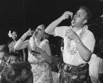 Robert S. Dietz eating poi, 10th Pacific Science Congress, Honolulu
