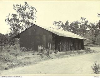 PORT MORESBY, NEW GUINEA. 1944-02-02. TWO MEMBERS OF THE 8TH ADVANCED AMMUNITION DEPOT STOCKTAKING AMMUNITION