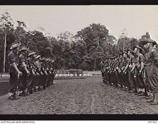 SOPUTA, NEW GUINEA. 1943-09-29. FIRING PARTY WAITING FOR THE FUNERAL CORTEGE OF BRIGADIER R. B. SUTHERLAND